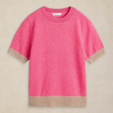 Load image into Gallery viewer, A short-sleeve crewneck knit sweater in bright pink with contrasting beige ribbed trim at the collar, sleeve cuffs, and hem, displayed flat against a neutral beige background.