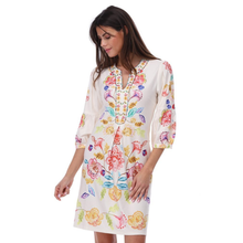 Load image into Gallery viewer, Woman wearing a floral dress on a white background