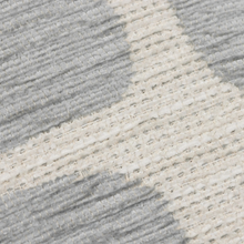 Load image into Gallery viewer, Close-up of a textured rug with gray and beige colors