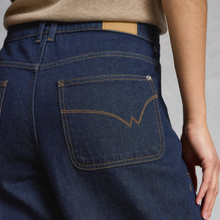 Load image into Gallery viewer, Close up of back of White Stuff Tia Dark Denim in dark denim, with a light grey background.