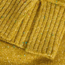 Load image into Gallery viewer, Close-up of a textured yellow fabric with ribbed pattern