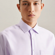 Load image into Gallery viewer, A close-up of a man wearing a light lavender long-sleeve button-down dress shirt against a neutral light gray background.
