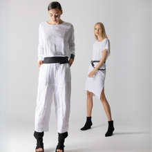 Load image into Gallery viewer, Two women wearing white outfits with black accents on a plain background