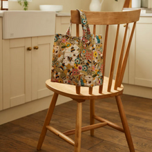 Load image into Gallery viewer, Bag hanging on back of chair with beekeeper motif
