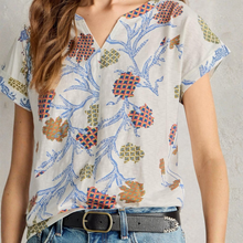 Load image into Gallery viewer, Close up image on Model of design and material of the White Stuff SS Nelly Notch Neck Tee, with a white background.