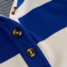 Load image into Gallery viewer, Close-up of a blue and white striped garment with buttons.