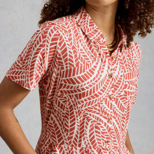 Load image into Gallery viewer, Person wearing a red and white patterned shirt against a gray background