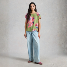 Load image into Gallery viewer, Women Wearing top with jeans on a grey background