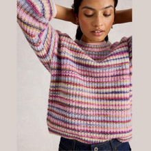 Load image into Gallery viewer, Woman wearing a multicolored striped sweater against a plain background
