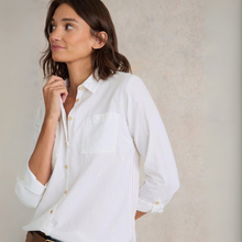 Load image into Gallery viewer, Woman wearing a white shirt against a neutral background