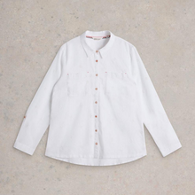 Load image into Gallery viewer, White shirt with brown buttons on a beige background