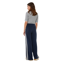 Load image into Gallery viewer, Back view of model wearing Esqualo Wide Stripe Modal Trousers in the colour Navy, with a white background.