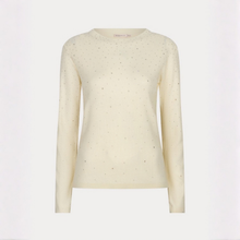 Load image into Gallery viewer, A cream-colored long-sleeve knit sweater with small scattered metallic embellishments, displayed on a clean white background.
