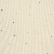 Load image into Gallery viewer, Close-up of a ribbed cream-colored fabric with scattered small clear rhinestones.
