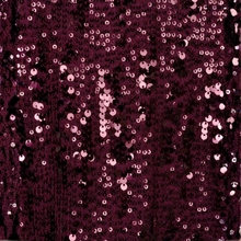 Load image into Gallery viewer, A close-up of dark burgundy sequin fabric with light pink and silver reflective sequins scattered across a textured knit backing.
