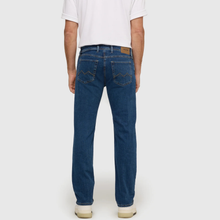 Load image into Gallery viewer, Person wearing blue jeans and a white shirt on a plain background
