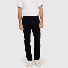 Load image into Gallery viewer, Person wearing black jeans and a white shirt on a white background
