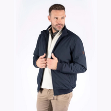 Load image into Gallery viewer, Man wearing a navy jacket on a white background
