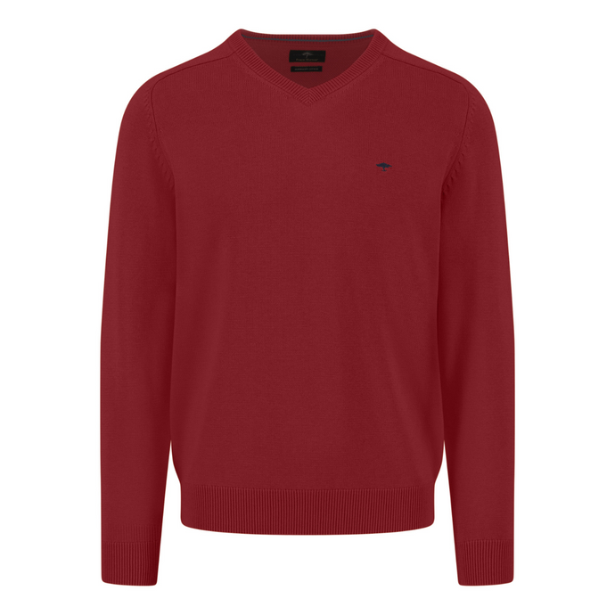 Red sweater with a small logo on a white background