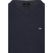 Load image into Gallery viewer, Navy sweater with a small logo on a white background
