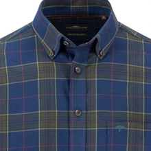 Load image into Gallery viewer, A close-up of a men's button-down shirt by FyreStation, featuring a blue base with a yellow, red, and green plaid pattern. The brand name 'FYRESTATION' is visible on the inner neck label, and a small embroidered logo is on the chest pocket.
