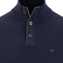 Load image into Gallery viewer, Close-up of a navy blue knit polo shirt with a mock neck, a zippered collar, and three brown buttons on a white background.
