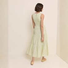 Load image into Gallery viewer, Woman wearing a light green checkered dress against a plain background
