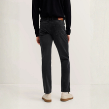 Load image into Gallery viewer, Person wearing black pants and a black sweater on a white background
