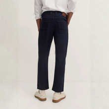 Load image into Gallery viewer, Person wearing navy pants and a white shirt on a white background
