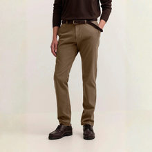 Load image into Gallery viewer, A person wearing slim-fit brown chinos with a dark brown belt, a dark brown long-sleeve shirt, and dark brown leather shoes, standing against a plain off-white studio background.
