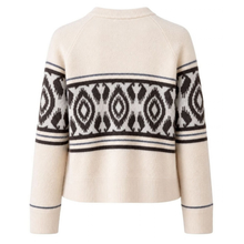 Load image into Gallery viewer, A cream-colored knit sweater with a black and white geometric Fair Isle pattern across the chest and sleeves, shown from the back on a white background.
