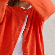 Load image into Gallery viewer, female model wearing red lulu cardi closeup with buttons showing
