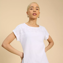 Load image into Gallery viewer, female model looking at camera wearing whitestuff anthea top in white colour 
