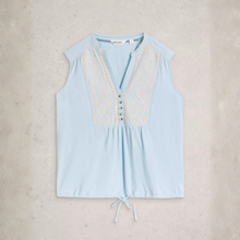 Load image into Gallery viewer, Light blue sleeveless top with lace details on a beige background
