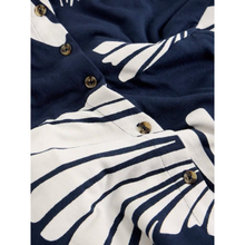 Load image into Gallery viewer, Navy and white striped shirt with button details on a white background
