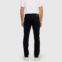Load image into Gallery viewer, Person wearing black jeans and a white shirt on a plain background
