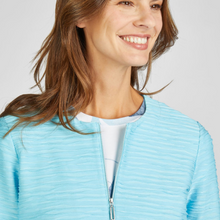 Load image into Gallery viewer, female model smiling wearing rabe jacket in blue colour closeup
