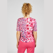 Load image into Gallery viewer, female model wearing rabe round neck top in magenta colour with arms down by side
