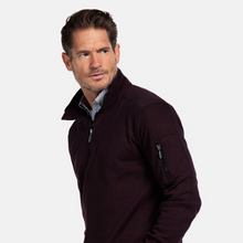 Load image into Gallery viewer, Man wearing a dark brown jacket on a light gray background
