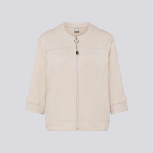 Load image into Gallery viewer, Beige jacket with a zipper on a light gray background
