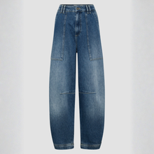 Load image into Gallery viewer, Blue jeans on a light gray background
