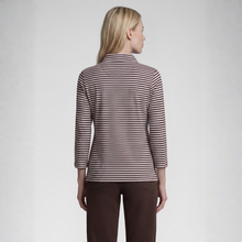 Load image into Gallery viewer, A woman shown from the back wearing a long-sleeve collared top with thin horizontal brown and beige stripes, paired with dark brown pants, against a light gray studio background.
