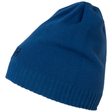Load image into Gallery viewer, A royal blue ribbed knit beanie hat with a small dark embroidered logo on the side, shown against a plain white background.
