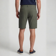 Load image into Gallery viewer, Person wearing green cargo shorts on a white background
