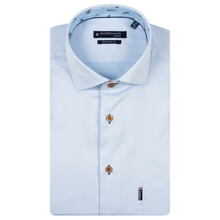Load image into Gallery viewer, Light blue dress shirt with patterned collar and buttons on a white background
