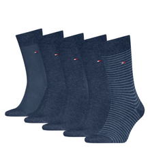 Load image into Gallery viewer, Five pairs of navy blue dress socks arranged in a fan shape on a white background. The front pair has thin horizontal stripes, while the others have a solid heathered texture.
