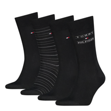Load image into Gallery viewer, Set of four black socks with Tommy Hilfiger branding on a white background
