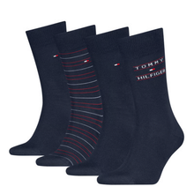 Load image into Gallery viewer, Set of four dark blue socks with Tommy Hilfiger branding on a white background
