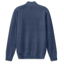Load image into Gallery viewer, Blue textured sweater on a white background
