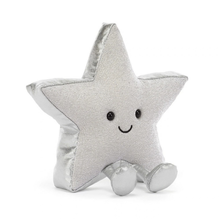 Load image into Gallery viewer, A silver glittery star-shaped plush toy with a smiling embroidered face and small feet, photographed on a clean white background.
